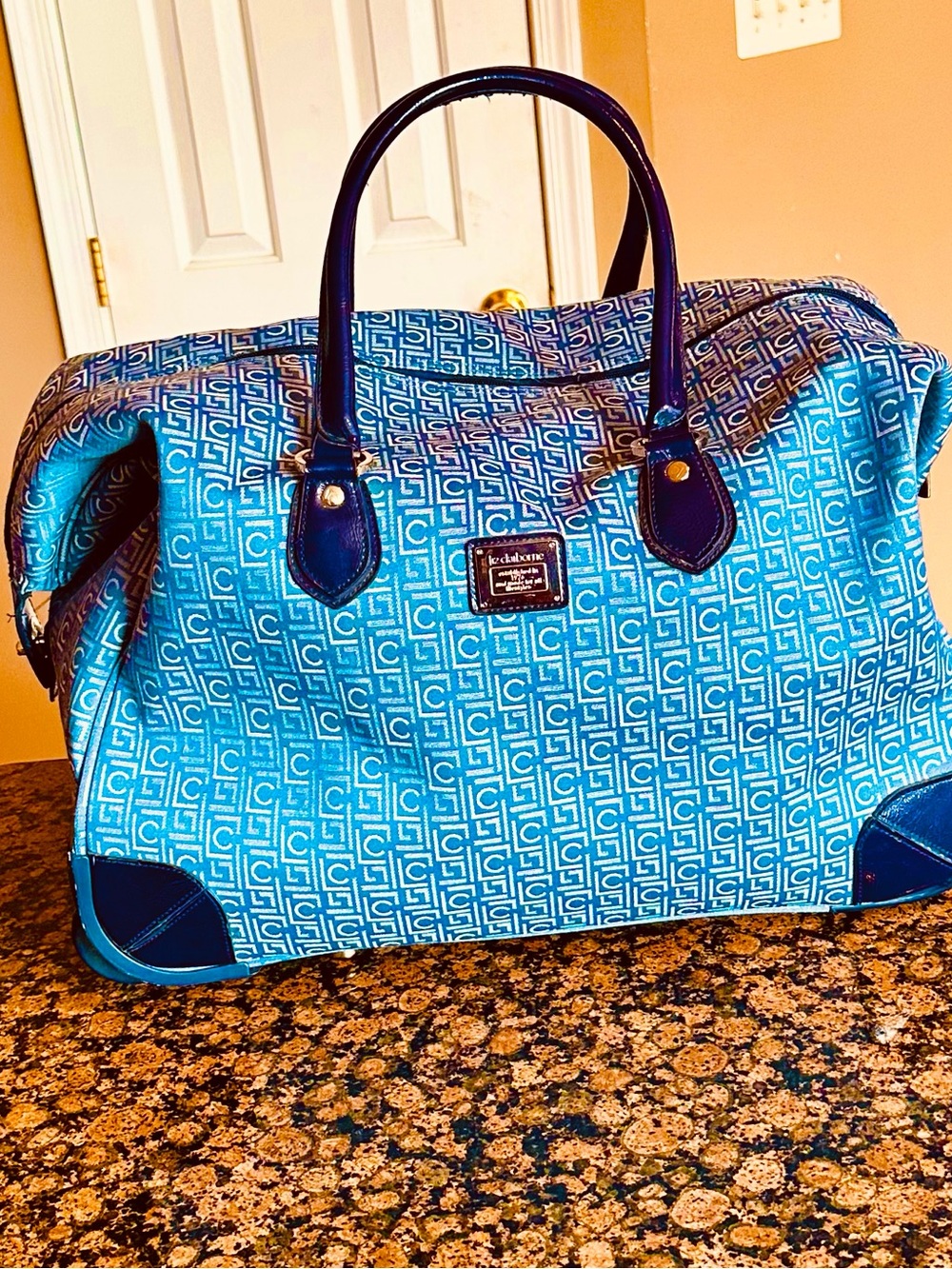 Liz Claiborne Big  Blue Travel bag with Rolling Wheels .  Classy Travel bag .
